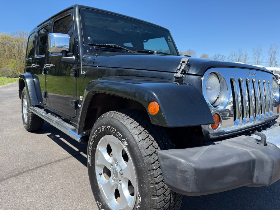 2013 Jeep Wrangler Unlimited 4WD 4dr Sahara, available for sale in Ortonville, Michigan | Marsh Auto Sales LLC. Ortonville, Michigan 2013 Jeep Wrangler Unlimited 4WD 4dr Sahara, available for sale in Ortonville, Michigan | Marsh Auto Sales LLC. Ortonville, Michigan