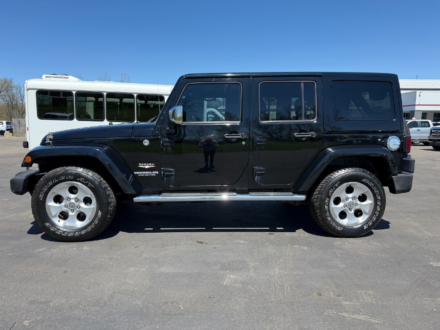 2013 Jeep Wrangler Unlimited 4WD 4dr Sahara, available for sale in Ortonville, Michigan | Marsh Auto Sales LLC. Ortonville, Michigan 2013 Jeep Wrangler Unlimited 4WD 4dr Sahara, available for sale in Ortonville, Michigan | Marsh Auto Sales LLC. Ortonville, Michigan