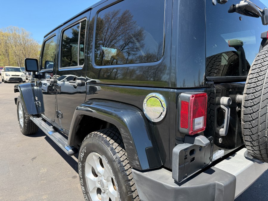 2013 Jeep Wrangler Unlimited 4WD 4dr Sahara, available for sale in Ortonville, Michigan | Marsh Auto Sales LLC. Ortonville, Michigan 2013 Jeep Wrangler Unlimited 4WD 4dr Sahara, available for sale in Ortonville, Michigan | Marsh Auto Sales LLC. Ortonville, Michigan