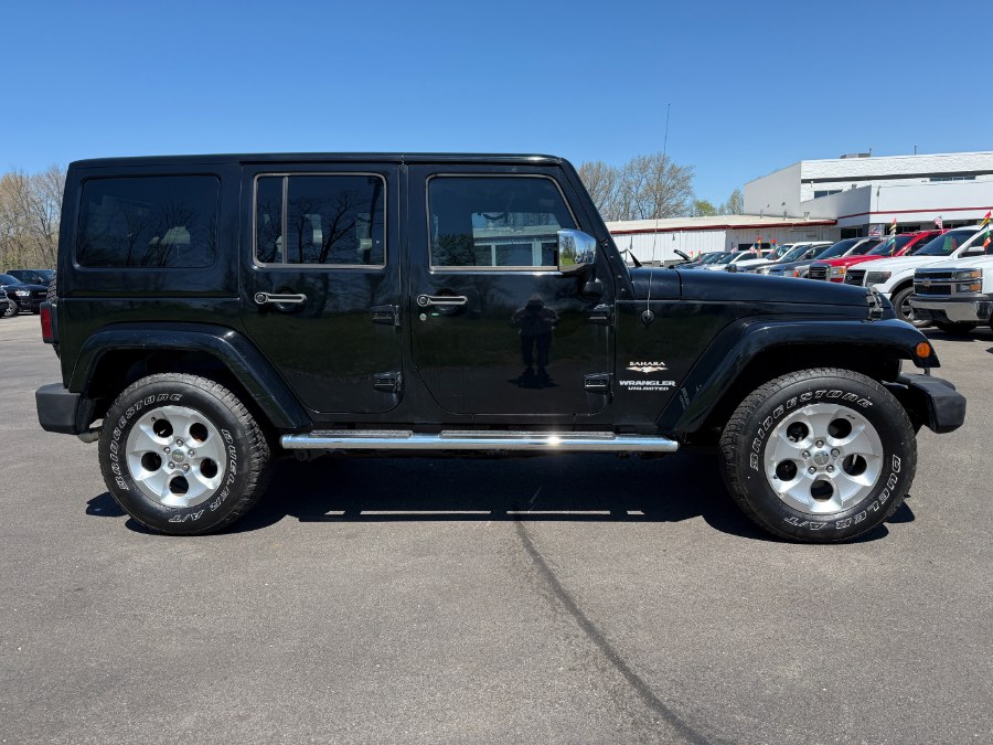 2013 Jeep Wrangler Unlimited 4WD 4dr Sahara, available for sale in Ortonville, Michigan | Marsh Auto Sales LLC. Ortonville, Michigan 2013 Jeep Wrangler Unlimited 4WD 4dr Sahara, available for sale in Ortonville, Michigan | Marsh Auto Sales LLC. Ortonville, Michigan
