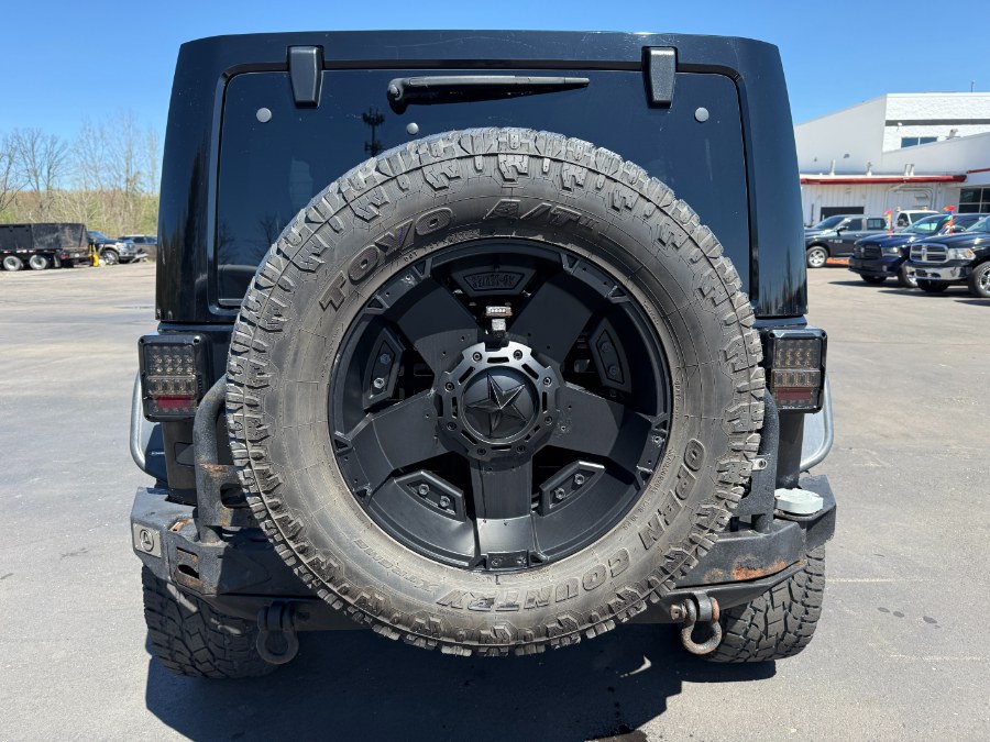 2015 Jeep Wrangler Unlimited 4WD 4dr Sahara, available for sale in Ortonville, Michigan | Marsh Auto Sales LLC. Ortonville, Michigan 2015 Jeep Wrangler Unlimited 4WD 4dr Sahara, available for sale in Ortonville, Michigan | Marsh Auto Sales LLC. Ortonville, Michigan