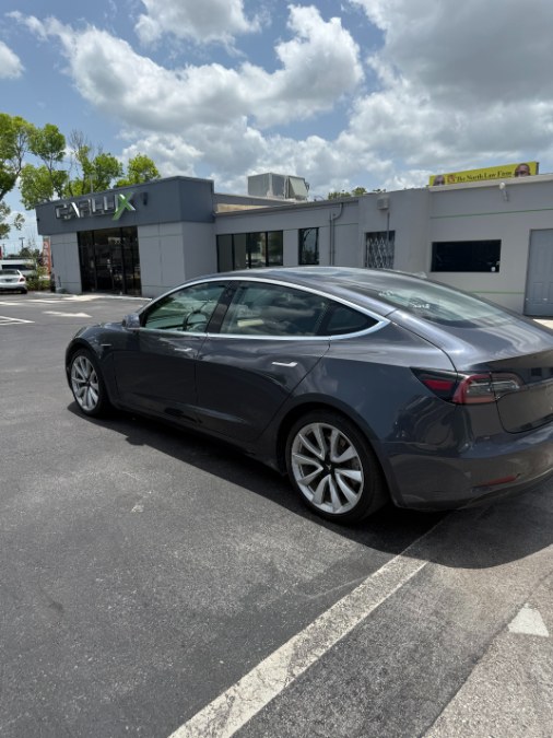 2018 Tesla Model 3 Mid Range Battery RWD, available for sale in Fort Myers, Florida | Carlux Fort Myers. Fort Myers, Florida 2018 Tesla Model 3 Mid Range Battery RWD, available for sale in Fort Myers, Florida | Carlux Fort Myers. Fort Myers, Florida