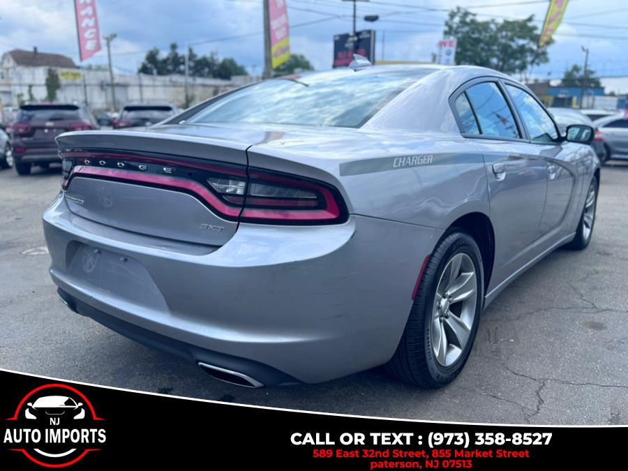 2016 Dodge Charger 4dr Sdn SXT RWD, available for sale in Paterson, New Jersey | NJ Auto Imports. Paterson, New Jersey 2016 Dodge Charger 4dr Sdn SXT RWD, available for sale in Paterson, New Jersey | NJ Auto Imports. Paterson, New Jersey