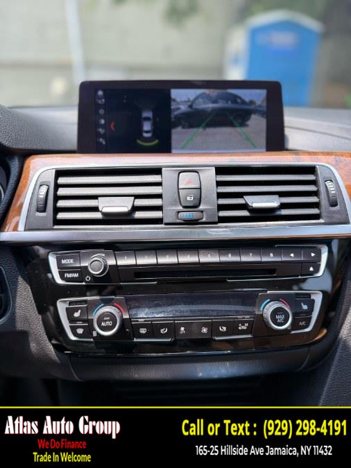 2018 BMW 3 Series 330i xDrive Sedan, available for sale in Jamaica, New York | Atlas Auto Group. Jamaica, New York 2018 BMW 3 Series 330i xDrive Sedan, available for sale in Jamaica, New York | Atlas Auto Group. Jamaica, New York