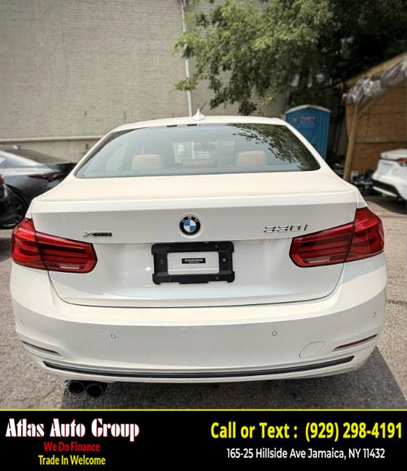 2018 BMW 3 Series 330i xDrive Sedan, available for sale in Jamaica, New York | Atlas Auto Group. Jamaica, New York 2018 BMW 3 Series 330i xDrive Sedan, available for sale in Jamaica, New York | Atlas Auto Group. Jamaica, New York