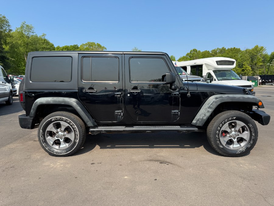 2014 Jeep Wrangler Unlimited 4WD 4dr Sport, available for sale in Ortonville, Michigan | Marsh Auto Sales LLC. Ortonville, Michigan 2014 Jeep Wrangler Unlimited 4WD 4dr Sport, available for sale in Ortonville, Michigan | Marsh Auto Sales LLC. Ortonville, Michigan