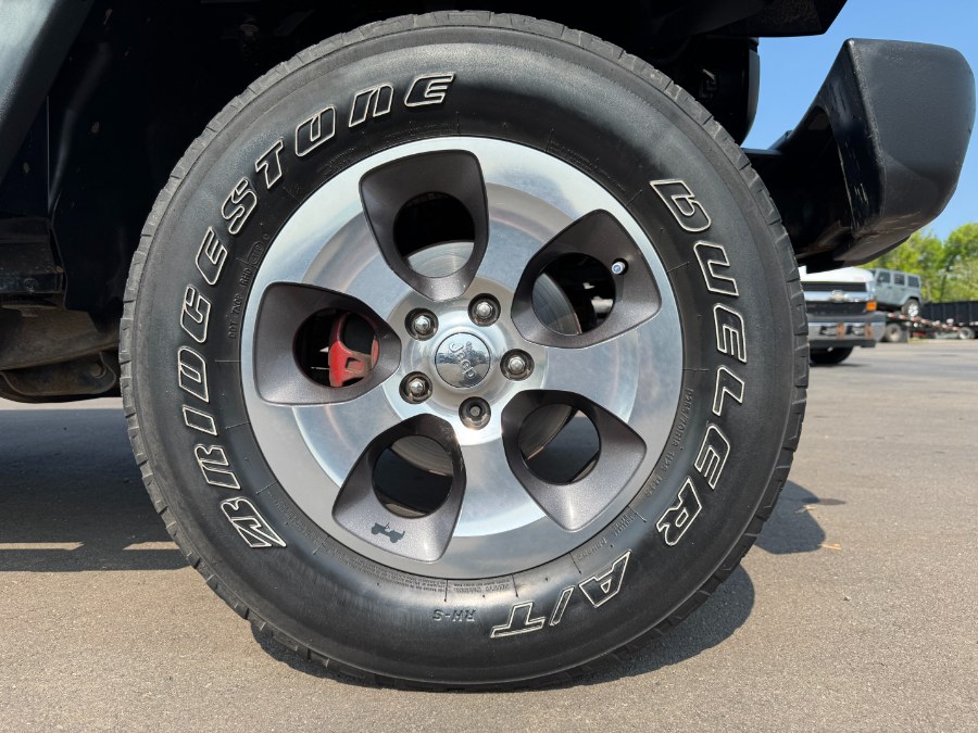2014 Jeep Wrangler Unlimited 4WD 4dr Sport, available for sale in Ortonville, Michigan | Marsh Auto Sales LLC. Ortonville, Michigan 2014 Jeep Wrangler Unlimited 4WD 4dr Sport, available for sale in Ortonville, Michigan | Marsh Auto Sales LLC. Ortonville, Michigan