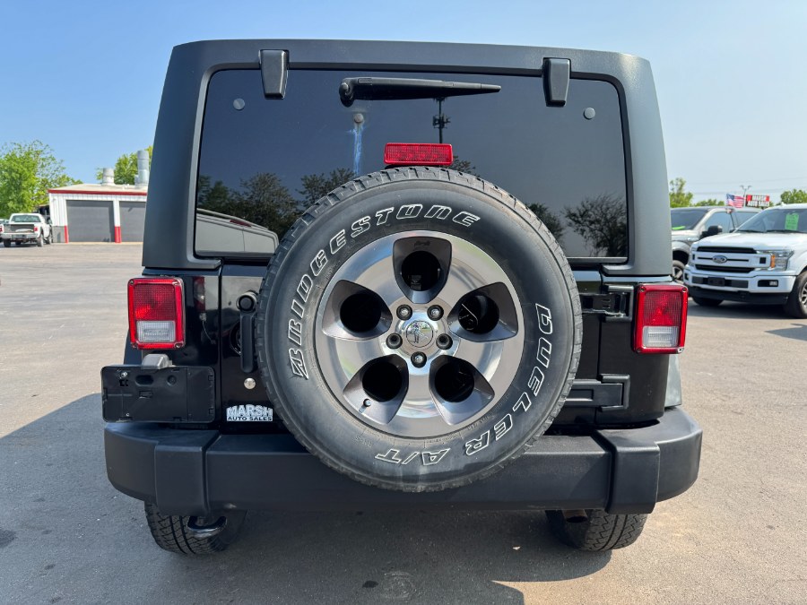 2014 Jeep Wrangler Unlimited 4WD 4dr Sport, available for sale in Ortonville, Michigan | Marsh Auto Sales LLC. Ortonville, Michigan 2014 Jeep Wrangler Unlimited 4WD 4dr Sport, available for sale in Ortonville, Michigan | Marsh Auto Sales LLC. Ortonville, Michigan