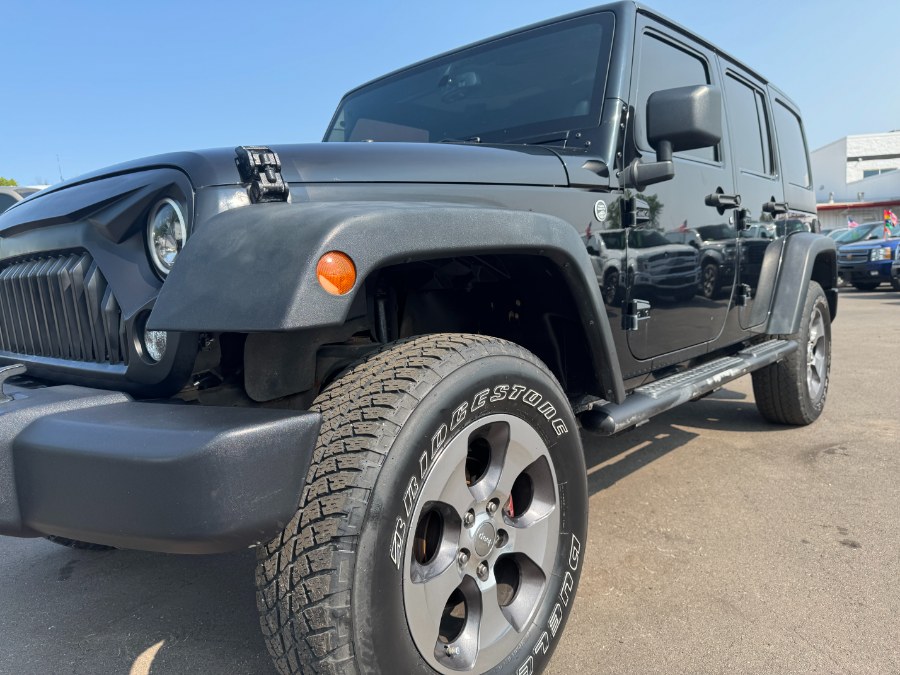 2014 Jeep Wrangler Unlimited 4WD 4dr Sport, available for sale in Ortonville, Michigan | Marsh Auto Sales LLC. Ortonville, Michigan 2014 Jeep Wrangler Unlimited 4WD 4dr Sport, available for sale in Ortonville, Michigan | Marsh Auto Sales LLC. Ortonville, Michigan