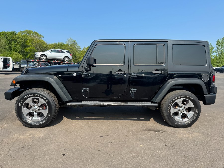 2014 Jeep Wrangler Unlimited 4WD 4dr Sport, available for sale in Ortonville, Michigan | Marsh Auto Sales LLC. Ortonville, Michigan 2014 Jeep Wrangler Unlimited 4WD 4dr Sport, available for sale in Ortonville, Michigan | Marsh Auto Sales LLC. Ortonville, Michigan