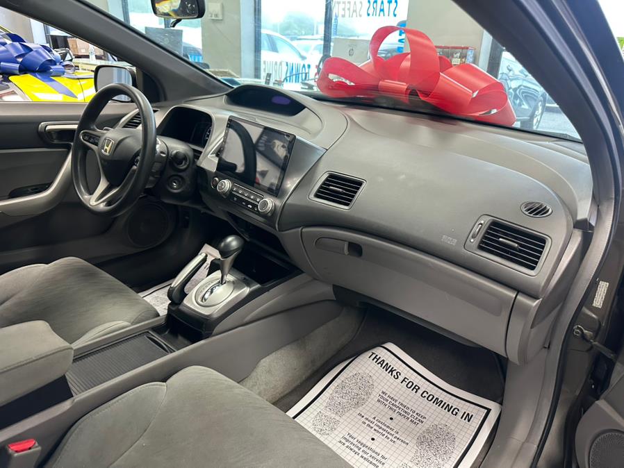 2006 Honda Civic Cpe EX AT, available for sale in Inwood, New York | 5 Towns Drive. Inwood, New York 2006 Honda Civic Cpe EX AT, available for sale in Inwood, New York | 5 Towns Drive. Inwood, New York