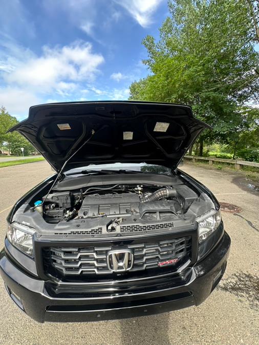 2013 Honda Ridgeline 4WD Crew Cab Sport, available for sale in New Britain, Connecticut | Supreme Automotive. New Britain, Connecticut 2013 Honda Ridgeline 4WD Crew Cab Sport, available for sale in New Britain, Connecticut | Supreme Automotive. New Britain, Connecticut