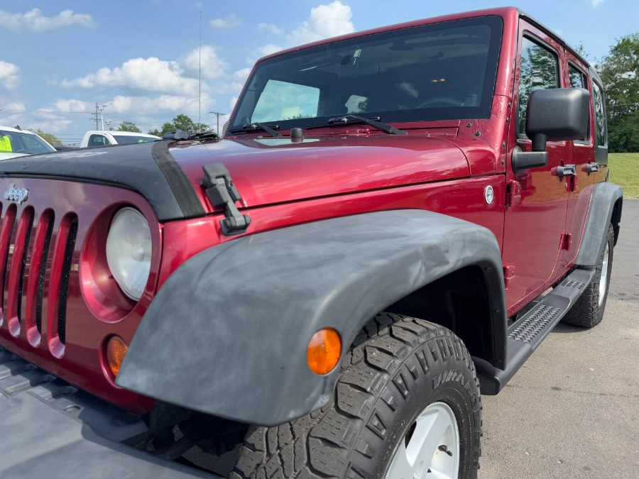 2011 Jeep Wrangler Unlimited 4WD 4dr Sport, available for sale in Ortonville, Michigan | Marsh Auto Sales LLC. Ortonville, Michigan 2011 Jeep Wrangler Unlimited 4WD 4dr Sport, available for sale in Ortonville, Michigan | Marsh Auto Sales LLC. Ortonville, Michigan