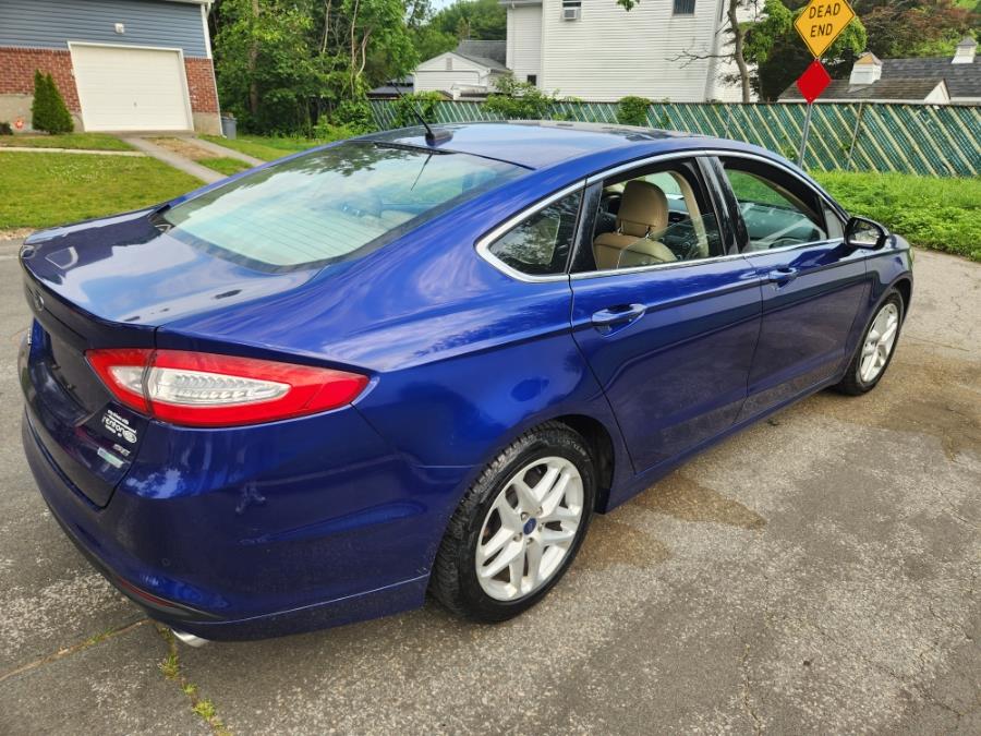 2014 Ford Fusion 4dr Sdn SE FWD, available for sale in West Babylon, New York | SGM Auto Sales. West Babylon, New York 2014 Ford Fusion 4dr Sdn SE FWD, available for sale in West Babylon, New York | SGM Auto Sales. West Babylon, New York
