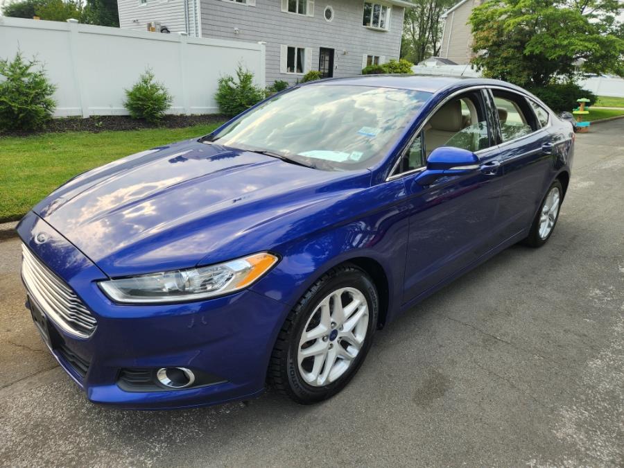 2014 Ford Fusion 4dr Sdn SE FWD, available for sale in West Babylon, New York | SGM Auto Sales. West Babylon, New York 2014 Ford Fusion 4dr Sdn SE FWD, available for sale in West Babylon, New York | SGM Auto Sales. West Babylon, New York