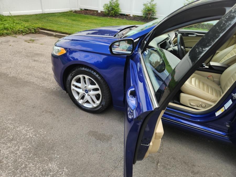 2014 Ford Fusion 4dr Sdn SE FWD, available for sale in West Babylon, New York | SGM Auto Sales. West Babylon, New York 2014 Ford Fusion 4dr Sdn SE FWD, available for sale in West Babylon, New York | SGM Auto Sales. West Babylon, New York