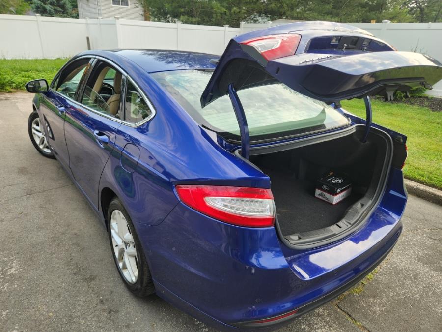 2014 Ford Fusion 4dr Sdn SE FWD, available for sale in West Babylon, New York | SGM Auto Sales. West Babylon, New York 2014 Ford Fusion 4dr Sdn SE FWD, available for sale in West Babylon, New York | SGM Auto Sales. West Babylon, New York