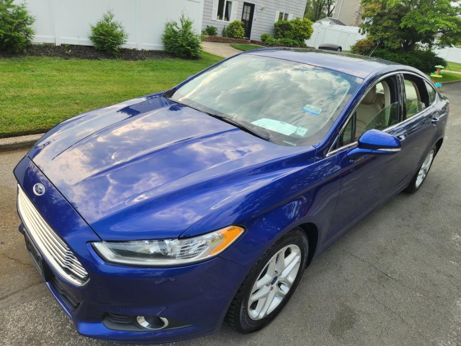 2014 Ford Fusion 4dr Sdn SE FWD, available for sale in West Babylon, New York | SGM Auto Sales. West Babylon, New York 2014 Ford Fusion 4dr Sdn SE FWD, available for sale in West Babylon, New York | SGM Auto Sales. West Babylon, New York