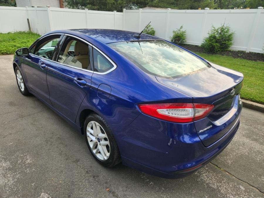 2014 Ford Fusion 4dr Sdn SE FWD, available for sale in West Babylon, New York | SGM Auto Sales. West Babylon, New York 2014 Ford Fusion 4dr Sdn SE FWD, available for sale in West Babylon, New York | SGM Auto Sales. West Babylon, New York