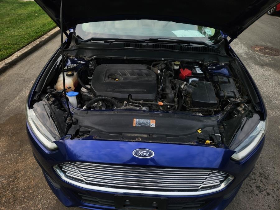 2014 Ford Fusion 4dr Sdn SE FWD, available for sale in West Babylon, New York | SGM Auto Sales. West Babylon, New York 2014 Ford Fusion 4dr Sdn SE FWD, available for sale in West Babylon, New York | SGM Auto Sales. West Babylon, New York