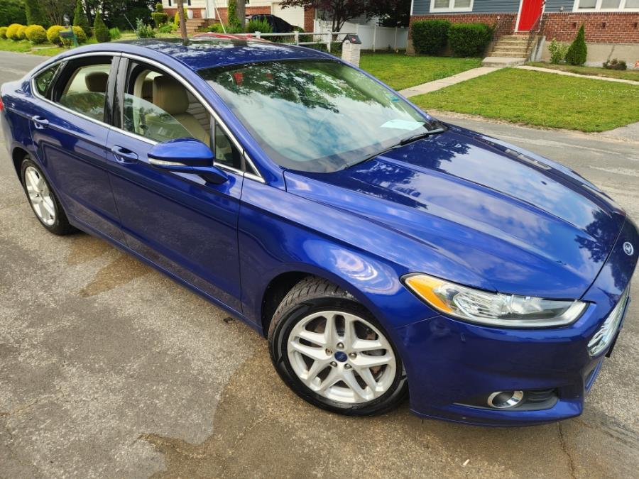 2014 Ford Fusion 4dr Sdn SE FWD, available for sale in West Babylon, New York | SGM Auto Sales. West Babylon, New York 2014 Ford Fusion 4dr Sdn SE FWD, available for sale in West Babylon, New York | SGM Auto Sales. West Babylon, New York
