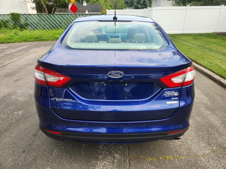 2014 Ford Fusion 4dr Sdn SE FWD, available for sale in West Babylon, New York | SGM Auto Sales. West Babylon, New York 2014 Ford Fusion 4dr Sdn SE FWD, available for sale in West Babylon, New York | SGM Auto Sales. West Babylon, New York