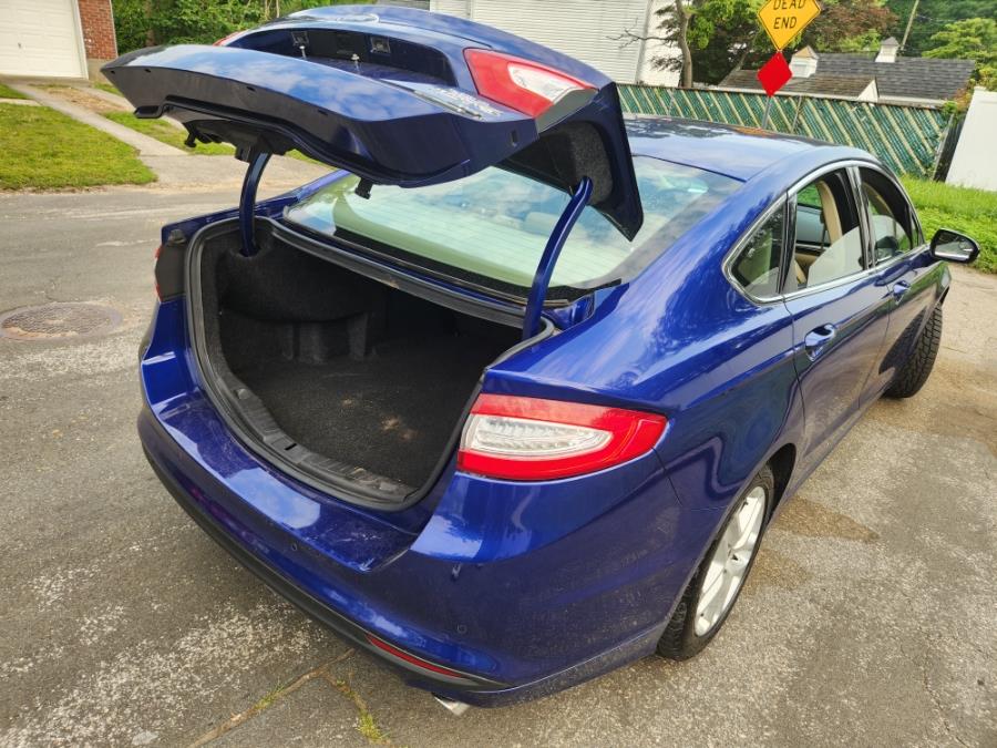 2014 Ford Fusion 4dr Sdn SE FWD, available for sale in West Babylon, New York | SGM Auto Sales. West Babylon, New York 2014 Ford Fusion 4dr Sdn SE FWD, available for sale in West Babylon, New York | SGM Auto Sales. West Babylon, New York