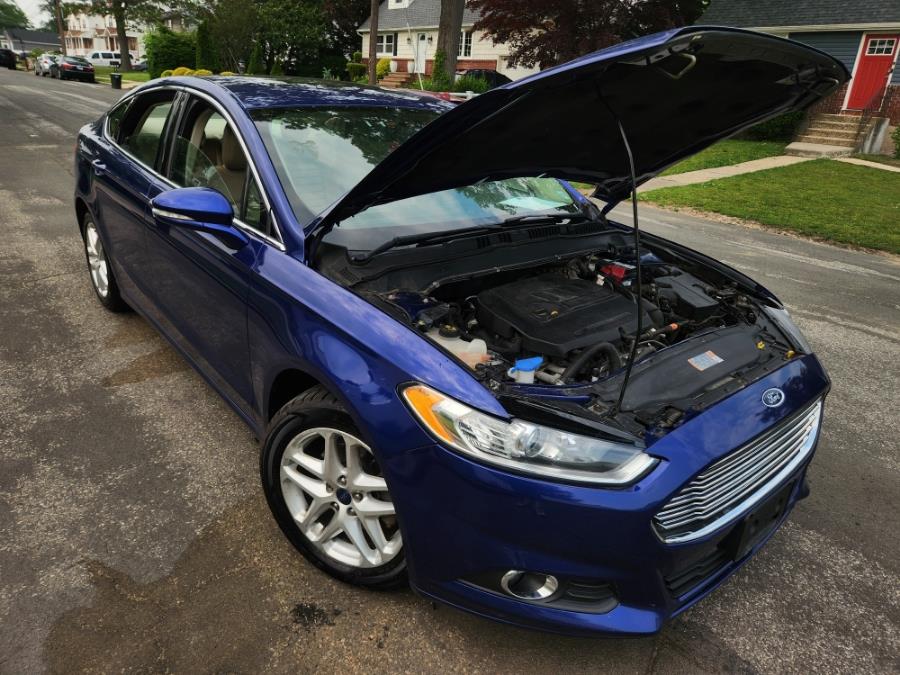 2014 Ford Fusion 4dr Sdn SE FWD, available for sale in West Babylon, New York | SGM Auto Sales. West Babylon, New York 2014 Ford Fusion 4dr Sdn SE FWD, available for sale in West Babylon, New York | SGM Auto Sales. West Babylon, New York