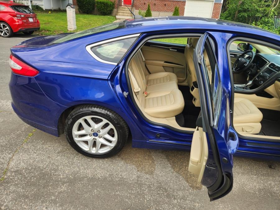 2014 Ford Fusion 4dr Sdn SE FWD, available for sale in West Babylon, New York | SGM Auto Sales. West Babylon, New York 2014 Ford Fusion 4dr Sdn SE FWD, available for sale in West Babylon, New York | SGM Auto Sales. West Babylon, New York