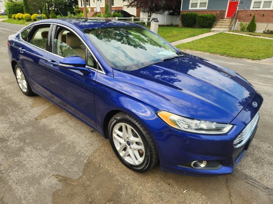 2014 Ford Fusion 4dr Sdn SE FWD, available for sale in West Babylon, New York | SGM Auto Sales. West Babylon, New York 2014 Ford Fusion 4dr Sdn SE FWD, available for sale in West Babylon, New York | SGM Auto Sales. West Babylon, New York
