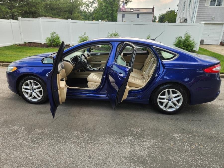 2014 Ford Fusion 4dr Sdn SE FWD, available for sale in West Babylon, New York | SGM Auto Sales. West Babylon, New York 2014 Ford Fusion 4dr Sdn SE FWD, available for sale in West Babylon, New York | SGM Auto Sales. West Babylon, New York