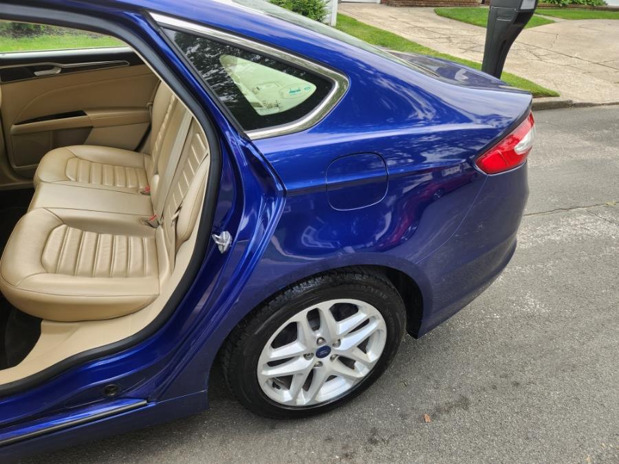 2014 Ford Fusion 4dr Sdn SE FWD, available for sale in West Babylon, New York | SGM Auto Sales. West Babylon, New York 2014 Ford Fusion 4dr Sdn SE FWD, available for sale in West Babylon, New York | SGM Auto Sales. West Babylon, New York
