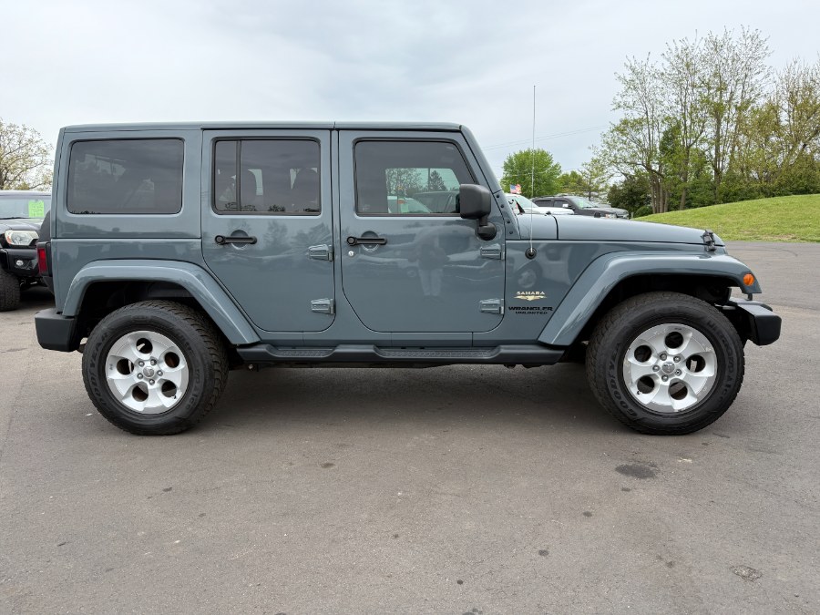 2014 Jeep Wrangler Unlimited 4WD 4dr Sahara, available for sale in Ortonville, Michigan | Marsh Auto Sales LLC. Ortonville, Michigan 2014 Jeep Wrangler Unlimited 4WD 4dr Sahara, available for sale in Ortonville, Michigan | Marsh Auto Sales LLC. Ortonville, Michigan