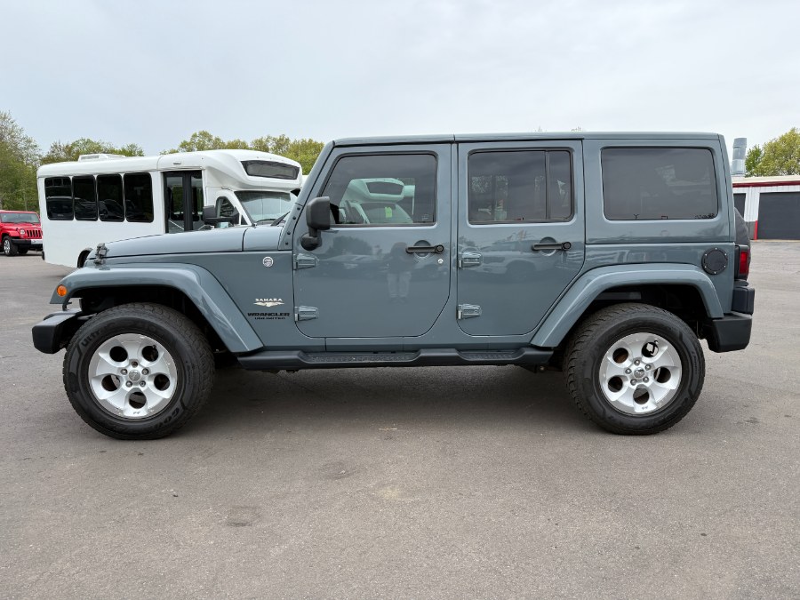 2014 Jeep Wrangler Unlimited 4WD 4dr Sahara, available for sale in Ortonville, Michigan | Marsh Auto Sales LLC. Ortonville, Michigan 2014 Jeep Wrangler Unlimited 4WD 4dr Sahara, available for sale in Ortonville, Michigan | Marsh Auto Sales LLC. Ortonville, Michigan
