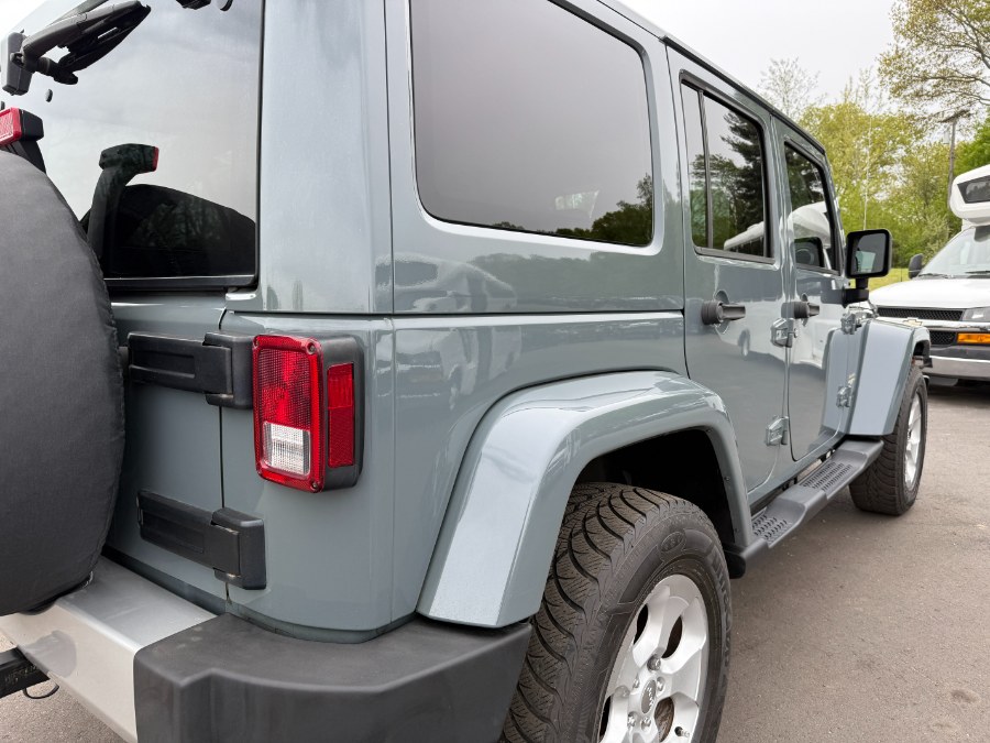 2014 Jeep Wrangler Unlimited 4WD 4dr Sahara, available for sale in Ortonville, Michigan | Marsh Auto Sales LLC. Ortonville, Michigan 2014 Jeep Wrangler Unlimited 4WD 4dr Sahara, available for sale in Ortonville, Michigan | Marsh Auto Sales LLC. Ortonville, Michigan