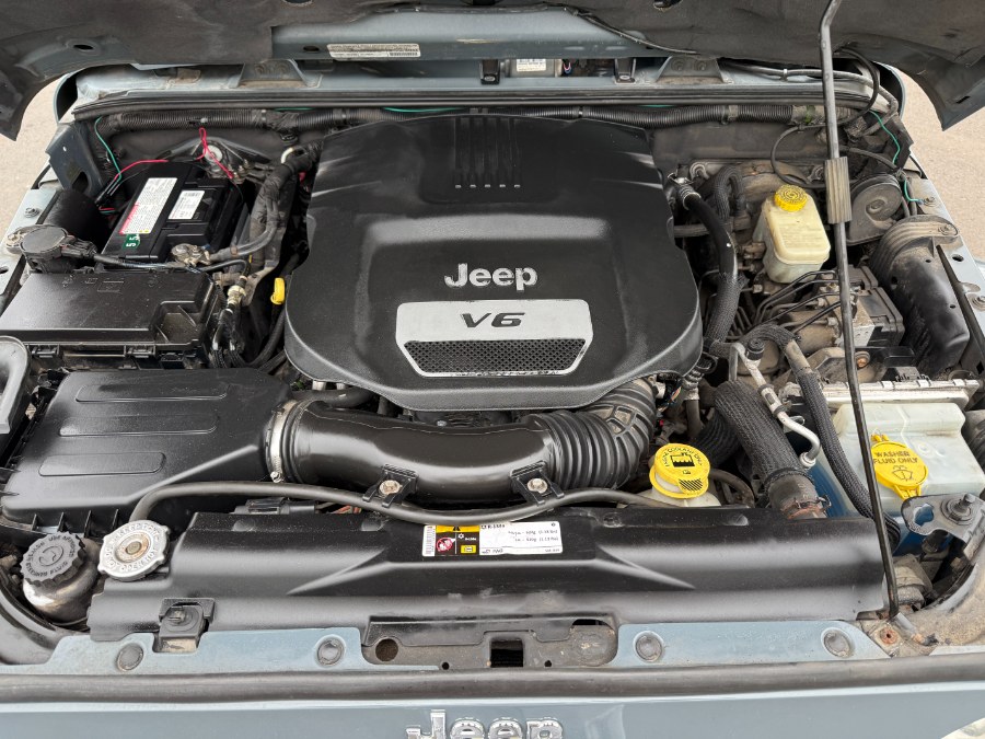 2014 Jeep Wrangler Unlimited 4WD 4dr Sahara, available for sale in Ortonville, Michigan | Marsh Auto Sales LLC. Ortonville, Michigan 2014 Jeep Wrangler Unlimited 4WD 4dr Sahara, available for sale in Ortonville, Michigan | Marsh Auto Sales LLC. Ortonville, Michigan