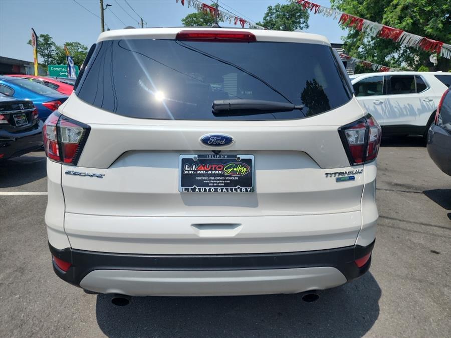 2018 Ford Escape Titanium 4WD, available for sale in Islip, New York | L.I. Auto Gallery. Islip, New York 2018 Ford Escape Titanium 4WD, available for sale in Islip, New York | L.I. Auto Gallery. Islip, New York