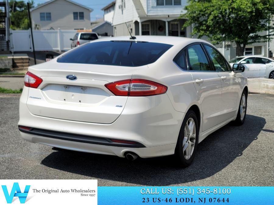 2013 Ford Fusion 4dr Sdn SE FWD, available for sale in Lodi, New Jersey | AW Auto & Truck Wholesalers, Inc. Lodi, New Jersey 2013 Ford Fusion 4dr Sdn SE FWD, available for sale in Lodi, New Jersey | AW Auto & Truck Wholesalers, Inc. Lodi, New Jersey
