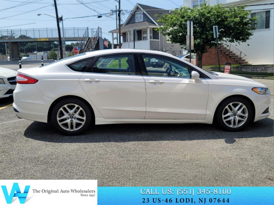 2013 Ford Fusion 4dr Sdn SE FWD, available for sale in Lodi, New Jersey | AW Auto & Truck Wholesalers, Inc. Lodi, New Jersey 2013 Ford Fusion 4dr Sdn SE FWD, available for sale in Lodi, New Jersey | AW Auto & Truck Wholesalers, Inc. Lodi, New Jersey