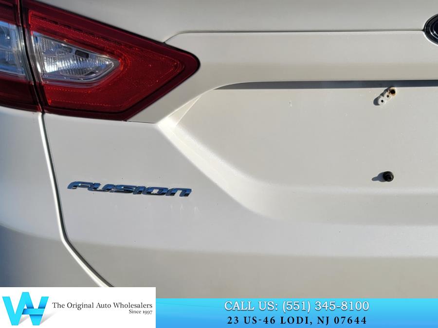 2013 Ford Fusion 4dr Sdn SE FWD, available for sale in Lodi, New Jersey | AW Auto & Truck Wholesalers, Inc. Lodi, New Jersey 2013 Ford Fusion 4dr Sdn SE FWD, available for sale in Lodi, New Jersey | AW Auto & Truck Wholesalers, Inc. Lodi, New Jersey