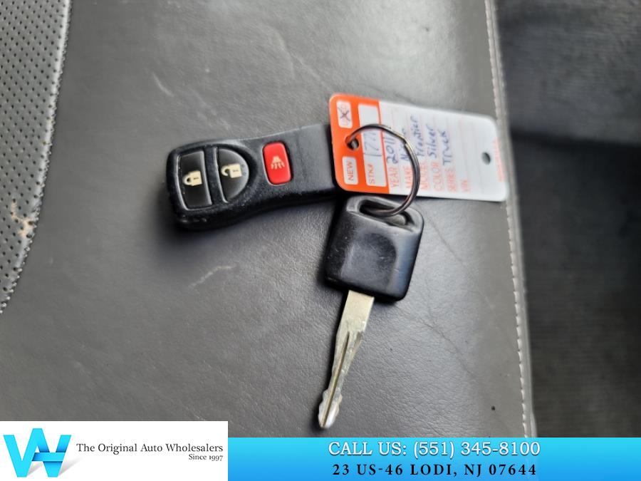 2011 Nissan Frontier 4WD Crew Cab SWB Auto SL, available for sale in Lodi, New Jersey | AW Auto & Truck Wholesalers, Inc. Lodi, New Jersey 2011 Nissan Frontier 4WD Crew Cab SWB Auto SL, available for sale in Lodi, New Jersey | AW Auto & Truck Wholesalers, Inc. Lodi, New Jersey