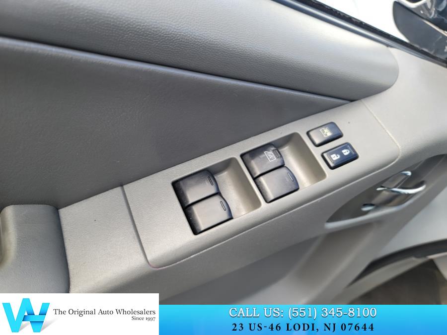 2011 Nissan Frontier 4WD Crew Cab SWB Auto SL, available for sale in Lodi, New Jersey | AW Auto & Truck Wholesalers, Inc. Lodi, New Jersey 2011 Nissan Frontier 4WD Crew Cab SWB Auto SL, available for sale in Lodi, New Jersey | AW Auto & Truck Wholesalers, Inc. Lodi, New Jersey