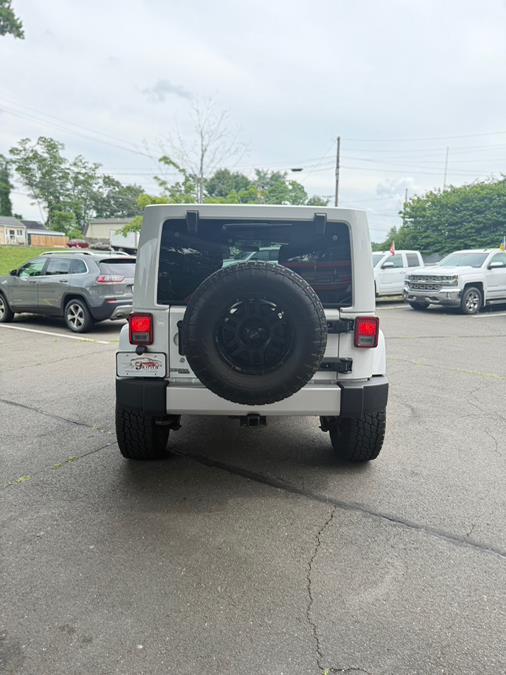 2012 Jeep Wrangler Unlimited 4WD 4dr Sahara, available for sale in Windsor Locks, Connecticut | JANNA MOTORS LLC. Windsor Locks, Connecticut 2012 Jeep Wrangler Unlimited 4WD 4dr Sahara, available for sale in Windsor Locks, Connecticut | JANNA MOTORS LLC. Windsor Locks, Connecticut
