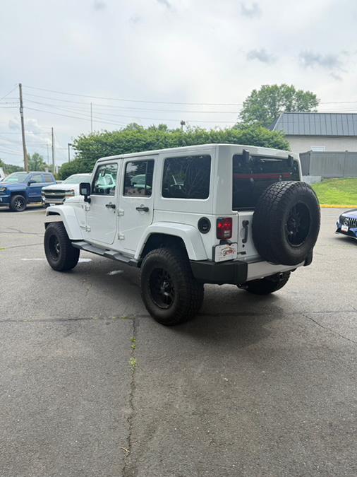 2012 Jeep Wrangler Unlimited 4WD 4dr Sahara, available for sale in Windsor Locks, Connecticut | JANNA MOTORS LLC. Windsor Locks, Connecticut 2012 Jeep Wrangler Unlimited 4WD 4dr Sahara, available for sale in Windsor Locks, Connecticut | JANNA MOTORS LLC. Windsor Locks, Connecticut