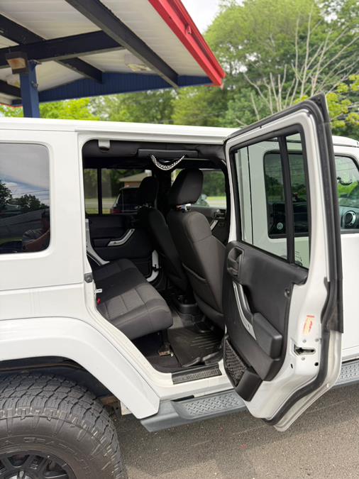 2012 Jeep Wrangler Unlimited 4WD 4dr Sahara, available for sale in Windsor Locks, Connecticut | JANNA MOTORS LLC. Windsor Locks, Connecticut 2012 Jeep Wrangler Unlimited 4WD 4dr Sahara, available for sale in Windsor Locks, Connecticut | JANNA MOTORS LLC. Windsor Locks, Connecticut