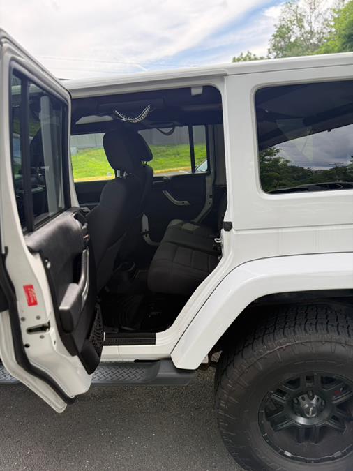 2012 Jeep Wrangler Unlimited 4WD 4dr Sahara, available for sale in Windsor Locks, Connecticut | JANNA MOTORS LLC. Windsor Locks, Connecticut 2012 Jeep Wrangler Unlimited 4WD 4dr Sahara, available for sale in Windsor Locks, Connecticut | JANNA MOTORS LLC. Windsor Locks, Connecticut