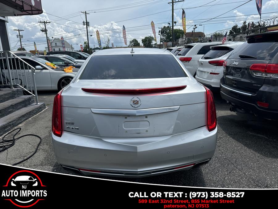 2013 Cadillac XTS 4dr Sdn Premium FWD, available for sale in Paterson, New Jersey | NJ Auto Imports. Paterson, New Jersey 2013 Cadillac XTS 4dr Sdn Premium FWD, available for sale in Paterson, New Jersey | NJ Auto Imports. Paterson, New Jersey