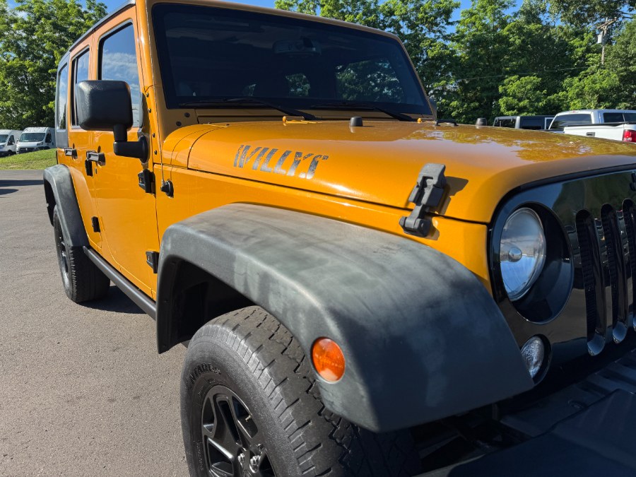 2014 Jeep Wrangler Unlimited 4WD 4dr Sport, available for sale in Ortonville, Michigan | Marsh Auto Sales LLC. Ortonville, Michigan 2014 Jeep Wrangler Unlimited 4WD 4dr Sport, available for sale in Ortonville, Michigan | Marsh Auto Sales LLC. Ortonville, Michigan
