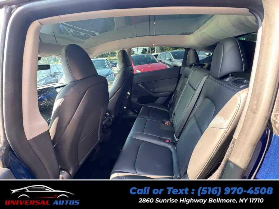 2023 Tesla Model Y Long Range AWD, available for sale in Bellmore, New York | Universal Autos. Bellmore, New York 2023 Tesla Model Y Long Range AWD, available for sale in Bellmore, New York | Universal Autos. Bellmore, New York