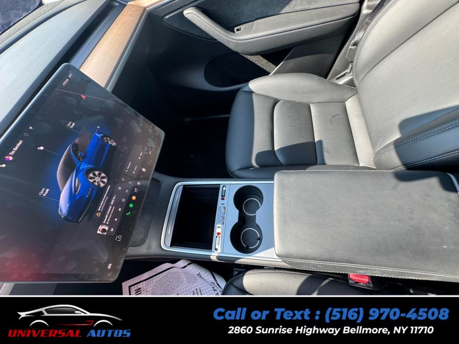 2023 Tesla Model Y Long Range AWD, available for sale in Bellmore, New York | Universal Autos. Bellmore, New York 2023 Tesla Model Y Long Range AWD, available for sale in Bellmore, New York | Universal Autos. Bellmore, New York